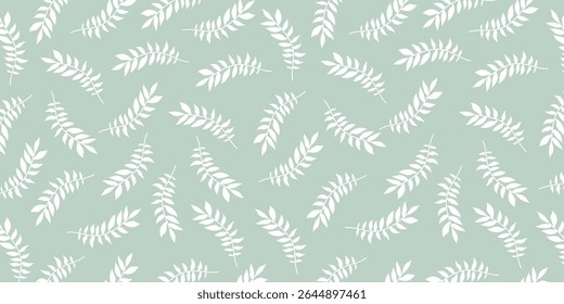 Seamless tropical leaf pattern with white foliage on soft green background. Ideal for fabric, wallpaper, eco packaging, botanical design, and natural theme illustrations. sstkBackgrounds