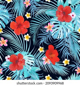 Seamless tropical motif with leaves and flowers