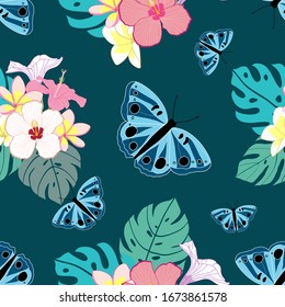 Seamless tropical pattern with butterfly, flowers and leaves on green background