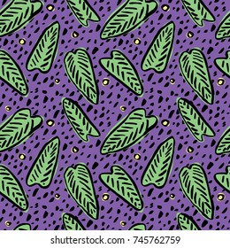 Seamless tropical pattern with hand drawn palm leaves