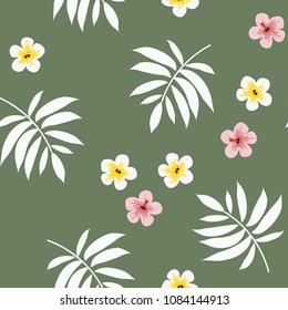 Seamless tropical pattern with hibiscus flowers and palm leaves.