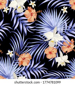 Seamless tropical pattern with jungle flowers and palm leaves. Summer print.