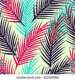 Seamless tropical pattern with jungle leaves and palm fronds.  Summer time illustration.