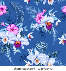 Seamless tropical pattern with orchids and hibiscus flowers for summer fabrics