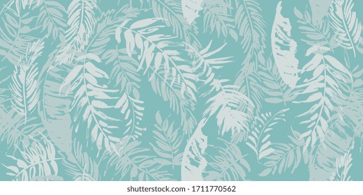 Seamless tropical pattern with palm leaves