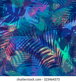 Seamless tropical pattern with palm leaves for fabric design and other uses.