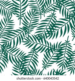 Seamless tropical pattern with palm leaves. Bright summer design on a background for printing on fabric, wallpaper and paper. Vector illustration. 