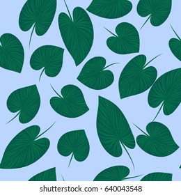 Seamless tropical pattern with palm leaves. Bright summer design on a background for printing on fabric, wallpaper and paper. Vector illustration. 