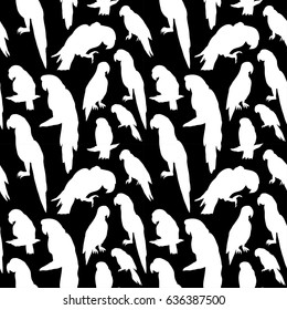 Seamless tropical pattern with parrot bird silhouette. Can be used for textile, website background, book cover, packaging.