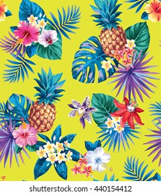 Seamless tropical pattern with pineapples, palm leaves and flowers. Vector illustration.