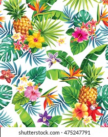 Seamless tropical pattern with pineapples, palm leaves and flowers. Vector illustration.