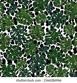 Seamless tropical pattern with plant leaves and leopard skin. Vector illustration, textile print. Modern design. 