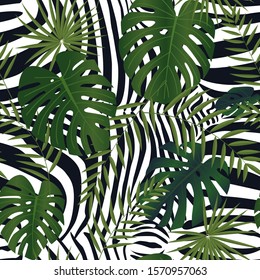 Seamless tropical pattern with plant leaves and zebra skin. Vector illustration, textile print. Modern design. 