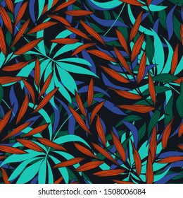 Seamless tropical pattern with plants and leaves in bright multi-colored colors. Beautiful print with hand drawn exotic plants. Modern abstract design for fabric, paper, interior decor