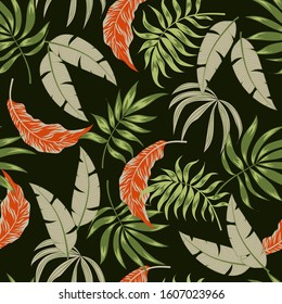 Seamless tropical pattern with plants and leaves on a green background. Floral seamless vector tropical background with exotic leaves, jungle leaf. Exotic wallpaper, Hawaiian style.
