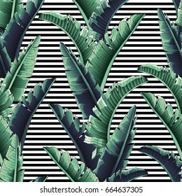 Patrón tropical sin fisuras con rayas. Hojas de palmera ilustración. Gráficos modernos. 