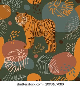 Seamless tropical pattern with tiger, leaves. African background. Design for wallpaper, textile design, packing, textile, fabric. Tropics, paradise, resort theme. Wild cat, feline