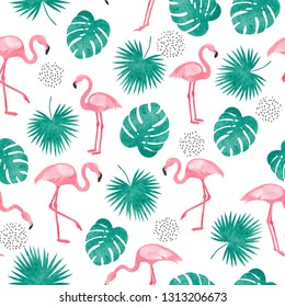 Seamless tropical pattern with watercolor flamingo and palm leaves. 