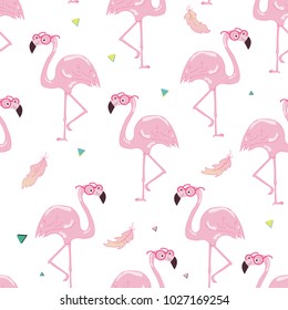Seamless tropical trendy pattern with flamingos and pink feathers. Vector summer background.