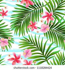 Seamless tropical vector pattern with hibiscus flowers and palm leaves. Jungle illustration for print design.