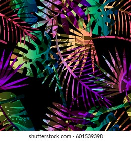 Seamless tropical vector pattern with tropical plants and palm leaves. Fashion jungle print for design.