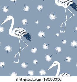 Seamless Tropical Vector Pattern with Storks and white dandelions on a blue background for textile, print, fabric