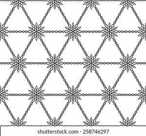 Seamless turkish geometric pattern with monochrome small flowers, leaves and hexagons.