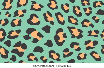 Seamless turquoise vector leopard pattern.  Trendy stylish wild leopard print. Animal print background for fabric, textile, design, advertising banner.