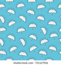 Seamless umbrella and rain drops pattern background.