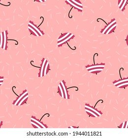 Seamless umbrella vector pattern. Repeat rain weather autumn background with cute rainy elements. Trendy blush pink fashion print design. Modern illustration.
