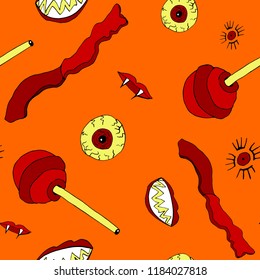 Seamless vecktor pattern of Halloween sweets and eyes on a orange background