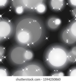 Seamless vector abstract background with white and black lights sparkle in soft bokeh, illustration pattern of defocused light circles randomly scattered across screen. Soft illumination.