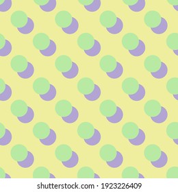 Seamless vector abstract pattern. Trendy summer round shapes. Geometric polka dot circles. Yellow, green, and purple repeat design. Perfect for fashion, fabric, textile, and web graphic design.