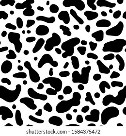 Seamless vector animal pattern. Hand drawn black isolated spots . Random spots similar to the color of the animal. Stylized Dalmatian, cow, cheetah, leopard print. Ornament for textile, clothes