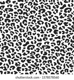 Seamless vector animal skin pattern. Leopard spots pattern. Black and white wildlife background. For fabric, textile, wrapping, cover, web etc. 10 eps design.