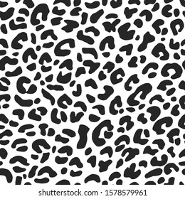 Seamless vector animal skin pattern. Leopard spots pattern. Black and white wildlife background. For fabric, textile, wrapping, cover, web etc. 10 eps design.