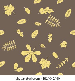 Seamless vector autumn leaves pattern. Acorns, oak, maple and others leaves print. Yellow leaves on coffee-colored background. 