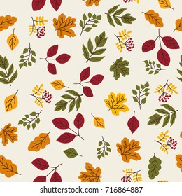 Seamless vector autumn pattern with red and orange berries and leaves. Fall colorful floral background. Elegant floral seamless pattern