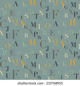 Seamless vector background of the alphabet in a scattered position