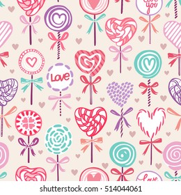 Seamless vector background with colorful heart shaped lollipops