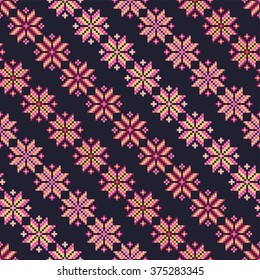 Seamless vector background with colorful Norwegian snowflakes. Print. Repeating background. Cloth design, wallpaper.