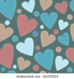 Seamless vector background of colorful stitched hearts