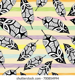 Seamless vector background with decorative feathers. Cloth design, wallpaper. Textile rapport.