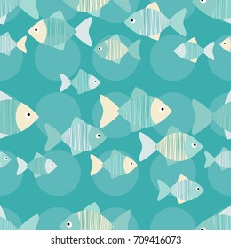 Seamless vector background with decorative fish. Scribble texture. Textile rapport.