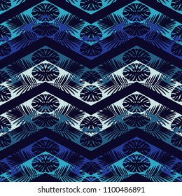 Seamless vector background with decorative leaves. The texture of the zigzag. Texture of palm leaves. Textile rapport.