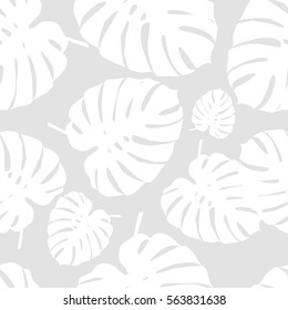 Seamless vector background with decorative leaves. Palm leaves. Print. Cloth design, wallpaper.