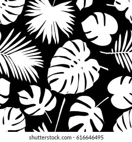 Seamless vector background with decorative leaves. Palm leaves.