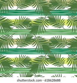Seamless vector background with decorative leaves. Palm leaves.
