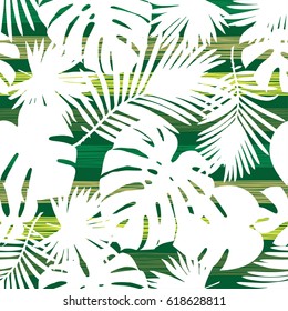 Seamless vector background with decorative leaves. Palm leaves.