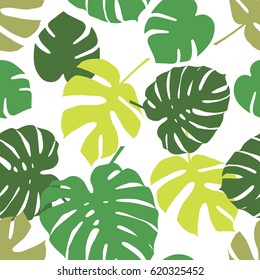 Seamless vector background with decorative leaves. Palm leaves.
